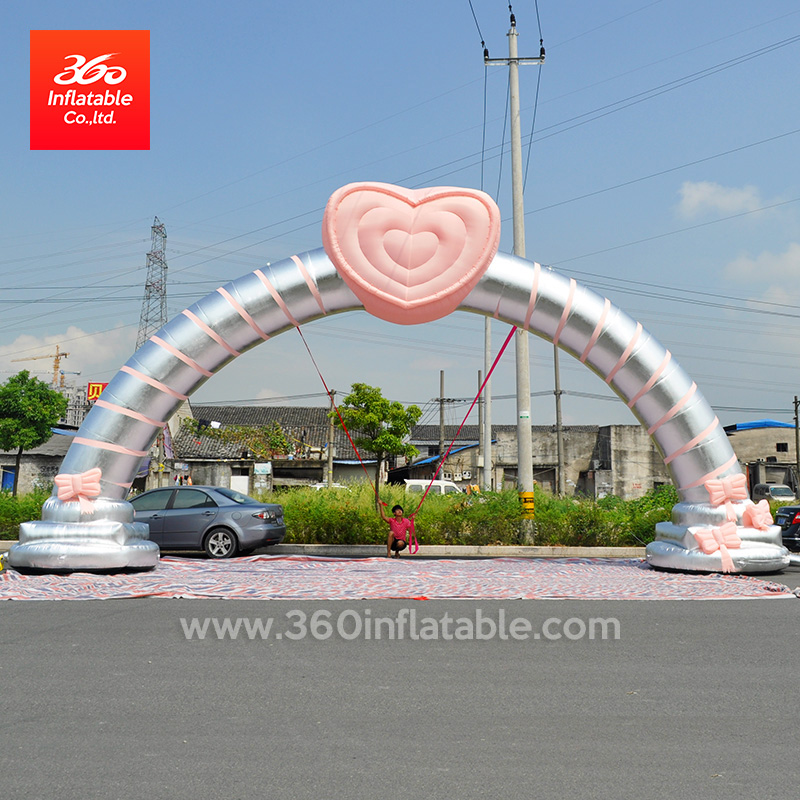 Arco de boda publicitario inflable romántico rosa y plateado personalizado